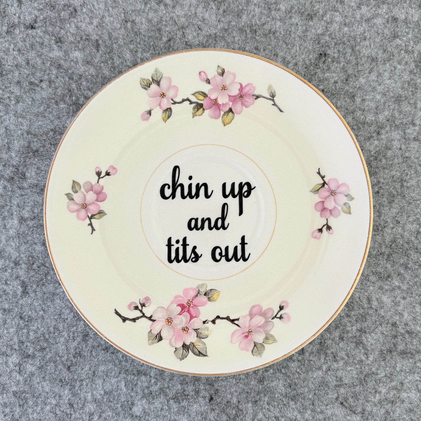 chin up and tits out