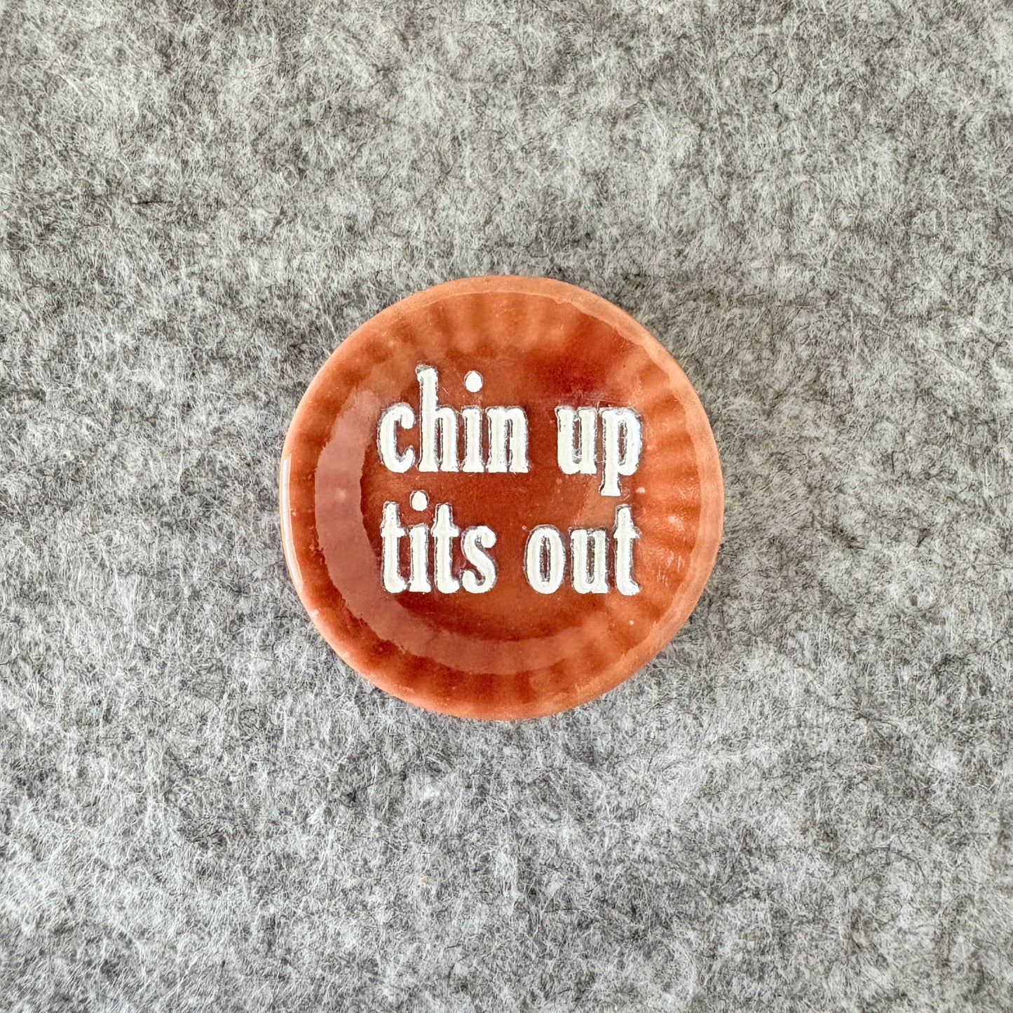 chin up tits out