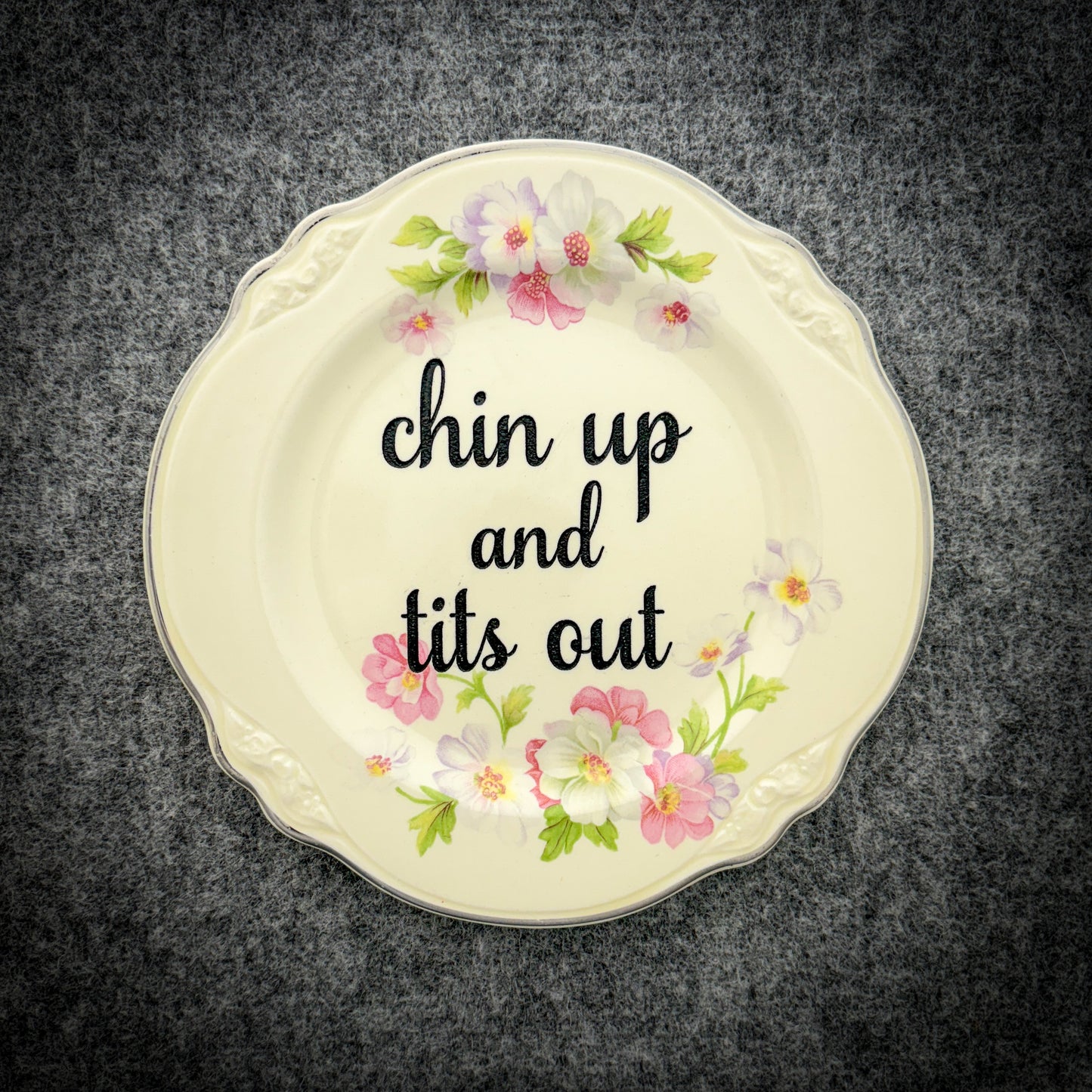 chin up and tits out